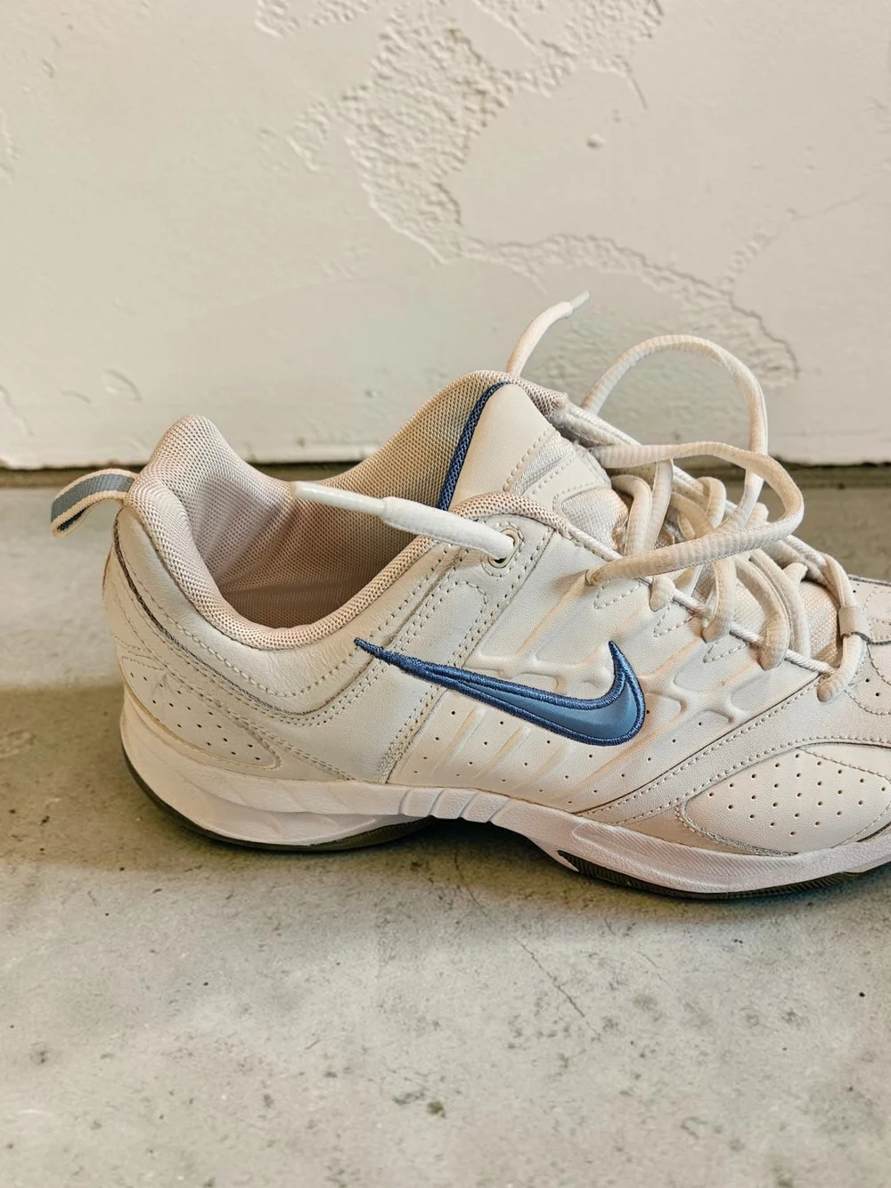 Nike White Leather Sneakers with Blue Swoosh
